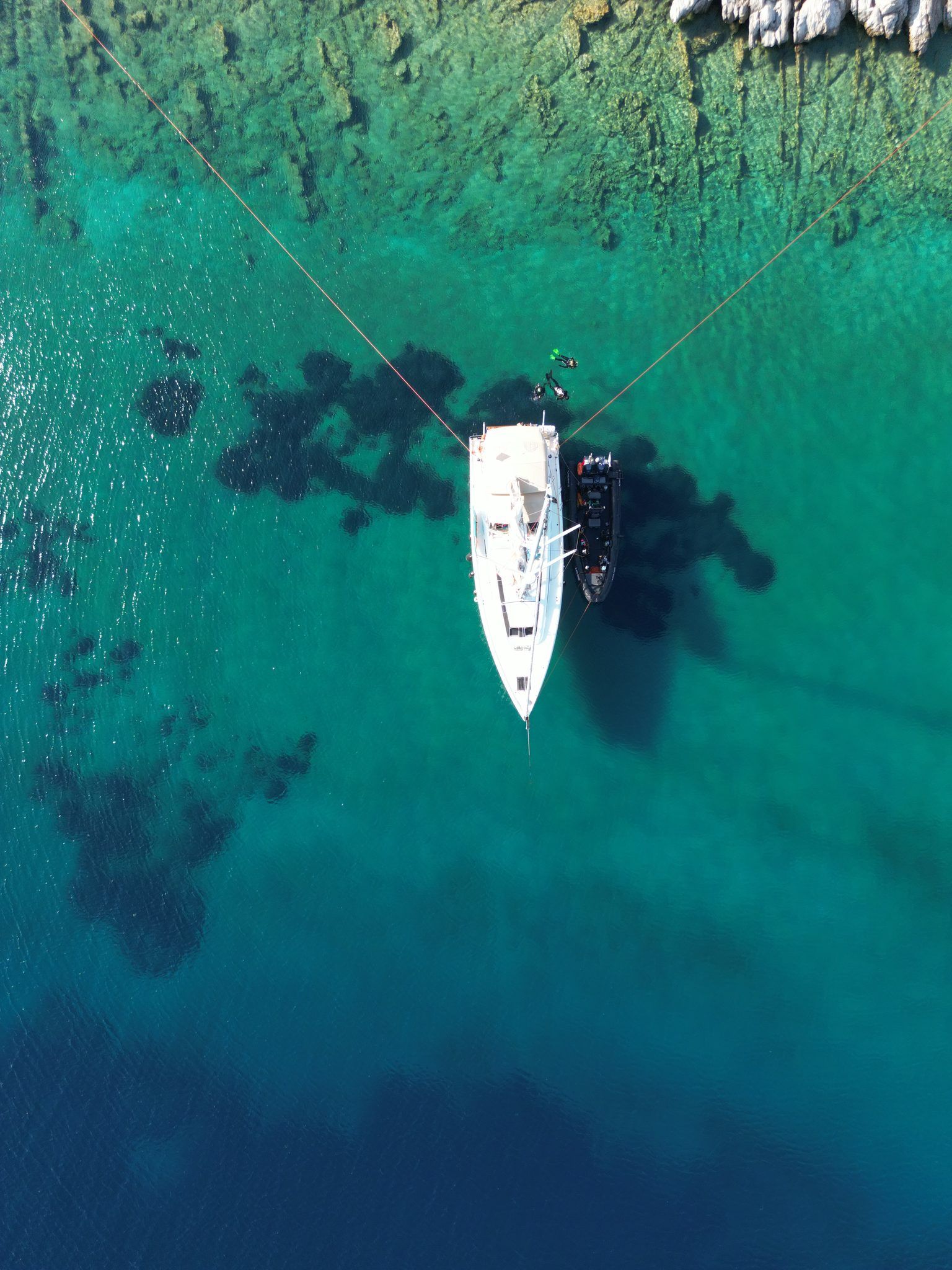 Two divers near the bow, from above